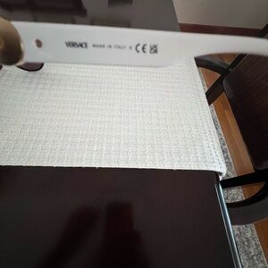 3 pair Prada sunglasses and a pair of Versace